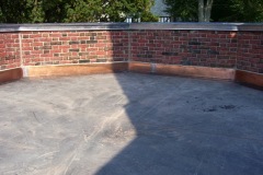 EPDM_rubber_membrane_on_a_flat_porch_roof__B_