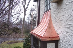 Copper_roof_on_a_bay_window_with_standing_semas_and_a_gutter__B_